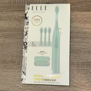 ELLE Sonic Electric Toothbrush & 4 Brush Heads/ New in the box